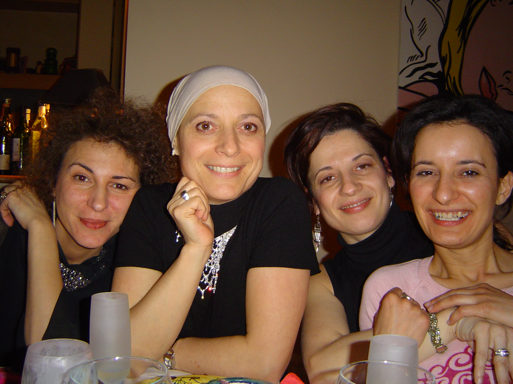 Paris. 2005. With my girlfriends Antonella van Rumund (to the left), and Carole Pean Mathurin and Laurence Brunet (to the right). A month or so into chemo after being diagnosed with my first breast cancer, and shortly after I first started practicing yoga. 